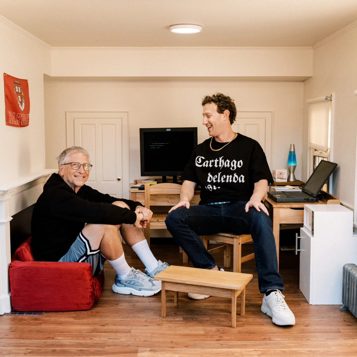 Mark Zuckerberg, wearing a t-shirt reading “Carthago delenda est”, sitting with Bill Gates in his old Harvard dorm room.